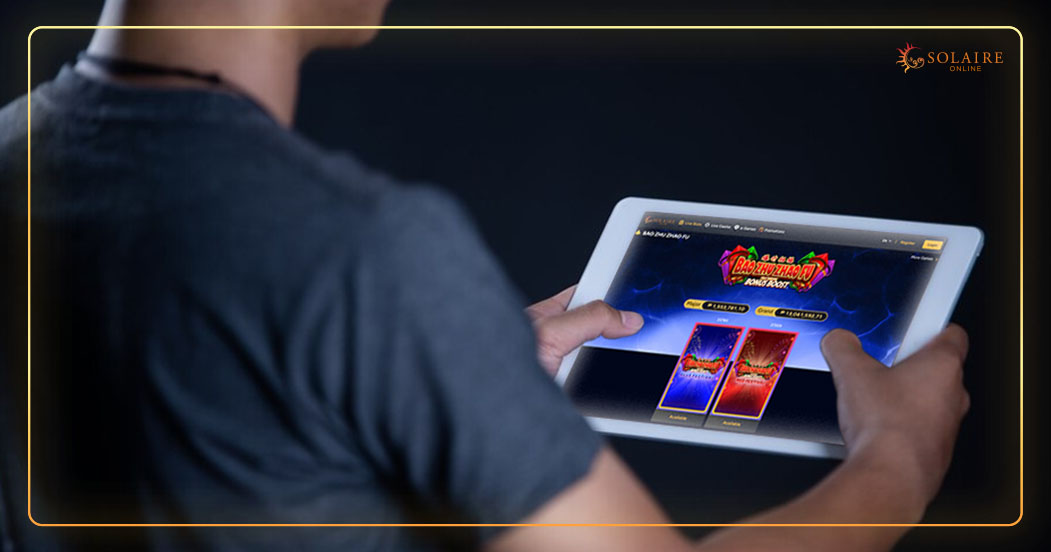 Bao Zhu Zhao Fu Slot Machine Tips - A Man Playing Live Slots In A Casino