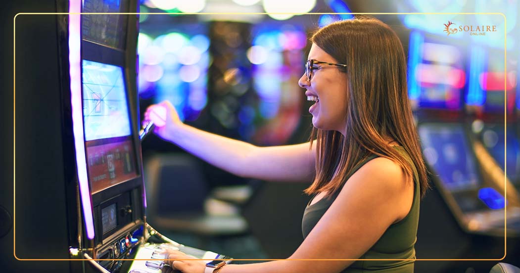 Bao Zhu Zhao Fu Slot Machine Tips - A Woman Playing Slot Machine In A Casino