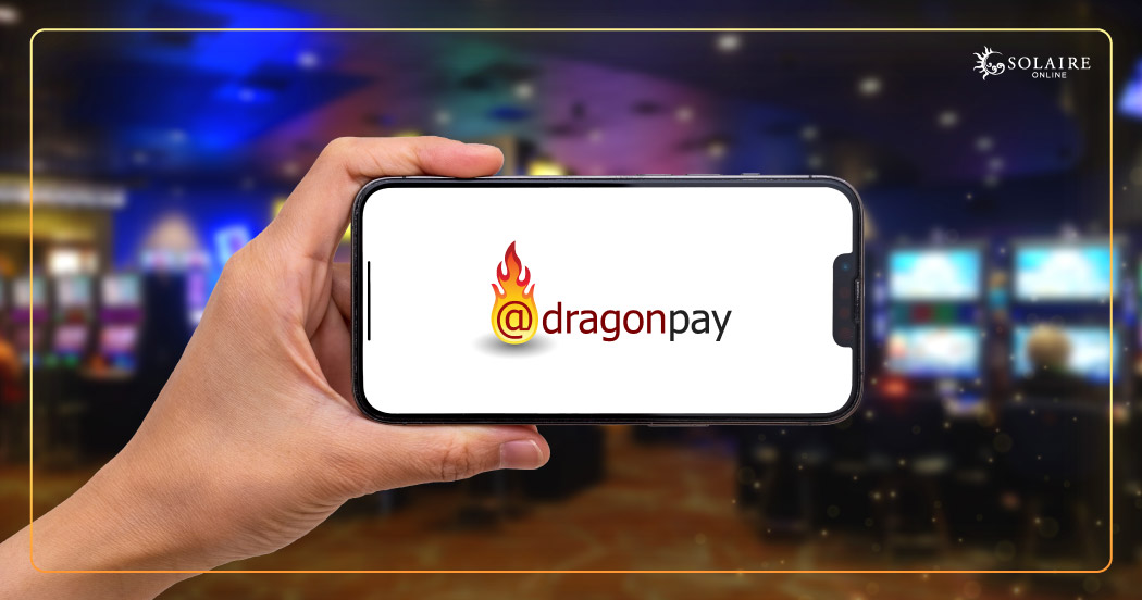 Dragonpay is Now Available on Solaire Online - Dragonpay Logo On Mobile Phone Screen