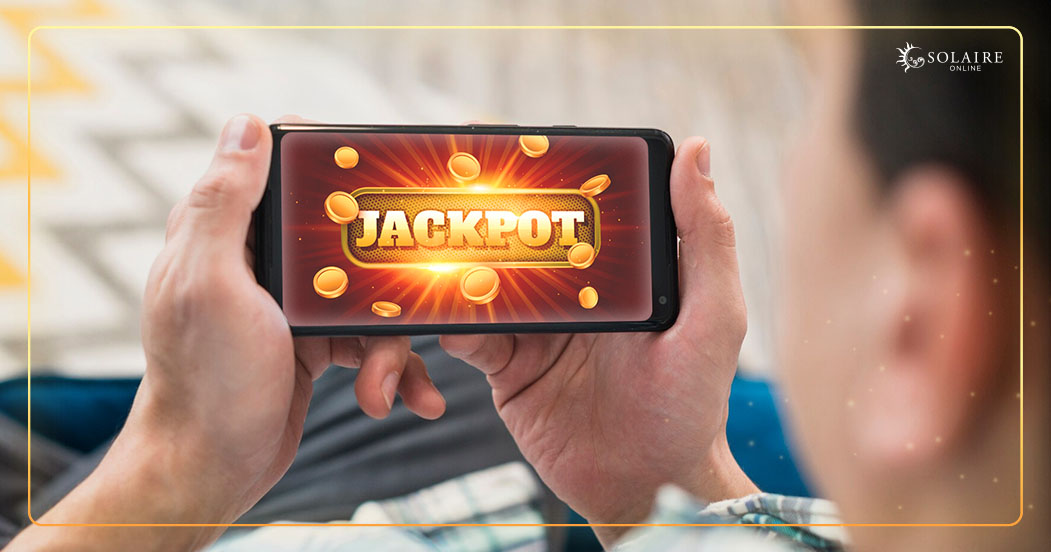 Solaire in Your Pocket The Future of Online Gaming - A Man Winning The Online Casino Jackpot On His Phone