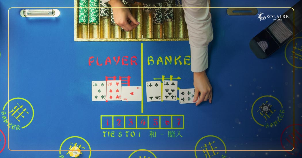 What Is Baccarat - A Person Revealing Cards On Baccarat Table