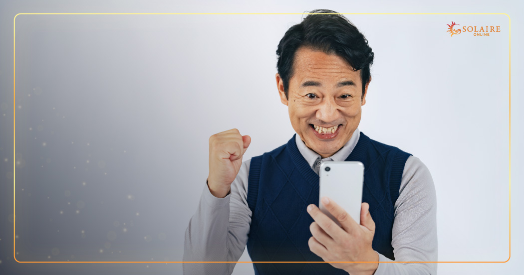 What Is Live Casino - A Man Enjoying Live Casino On His Phone