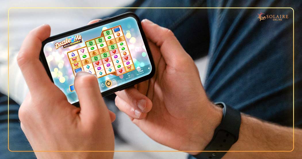 Where Can I Get the Solaire Online Casino Bonus - A Person Playing Online Casino On Phone